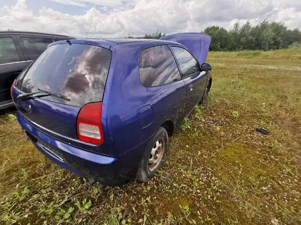 Alternador Mitsubishi Colt 1996 1.3L md325696 image 9