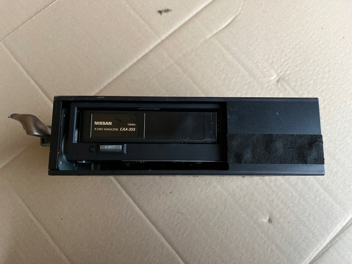 Vaihtaja levysoitin NISSAN CEDRIC 1998-2004 28184AG000