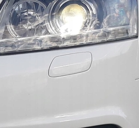 Audi OE 4F0955276C Cache de lave-phare image 2