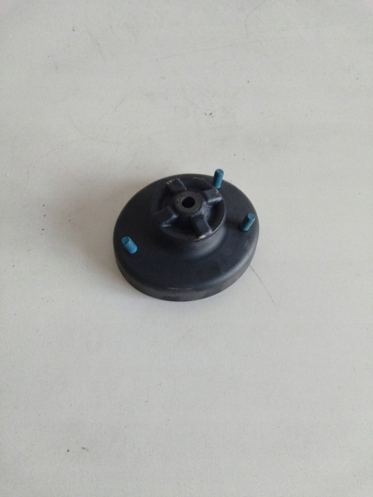 Iskunvaimentimen ylälaakeri takana Ford Escort MK VII OE 7234730