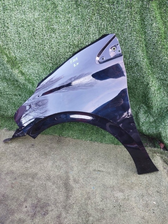 Vasen etulokasuoja Peugeot 208 I 12-18 alkuperäinen musta