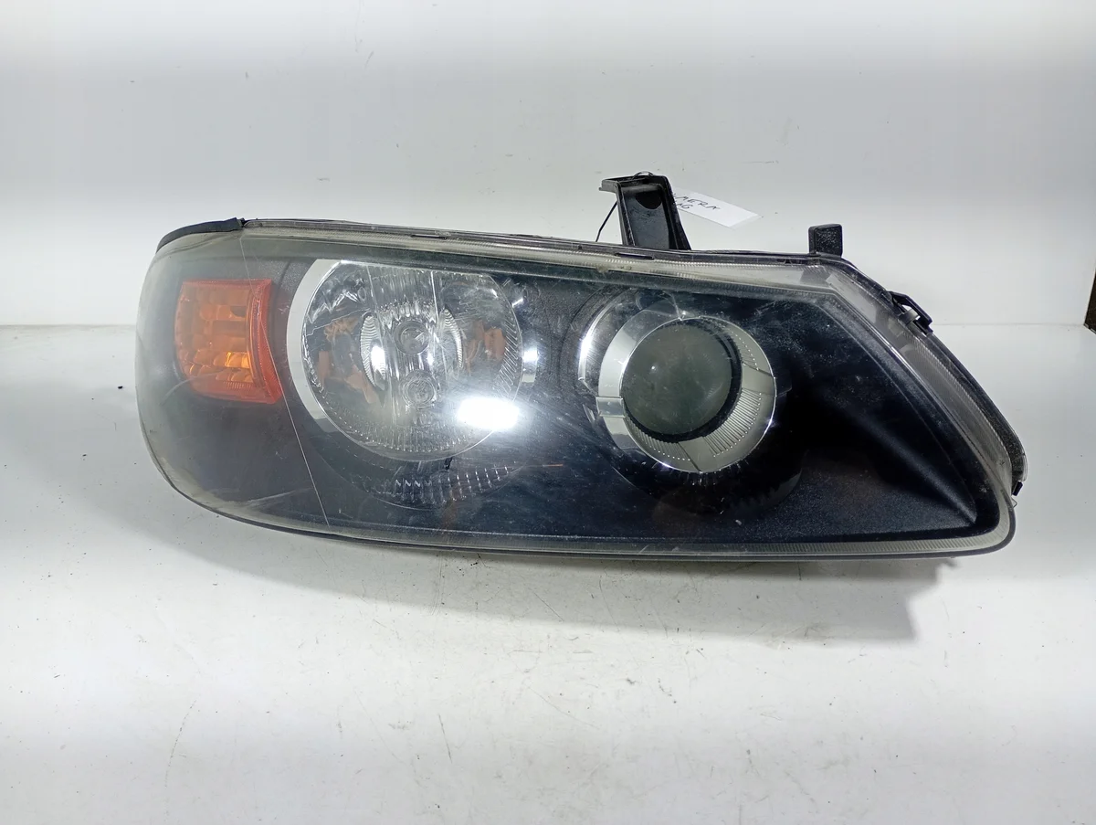 Nissan Almera N16 Strålkastare Höger Fram