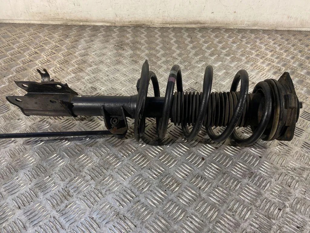 OEM 54303BR04A Amortecedor MacPherson Esquerdo Nissan image 2
