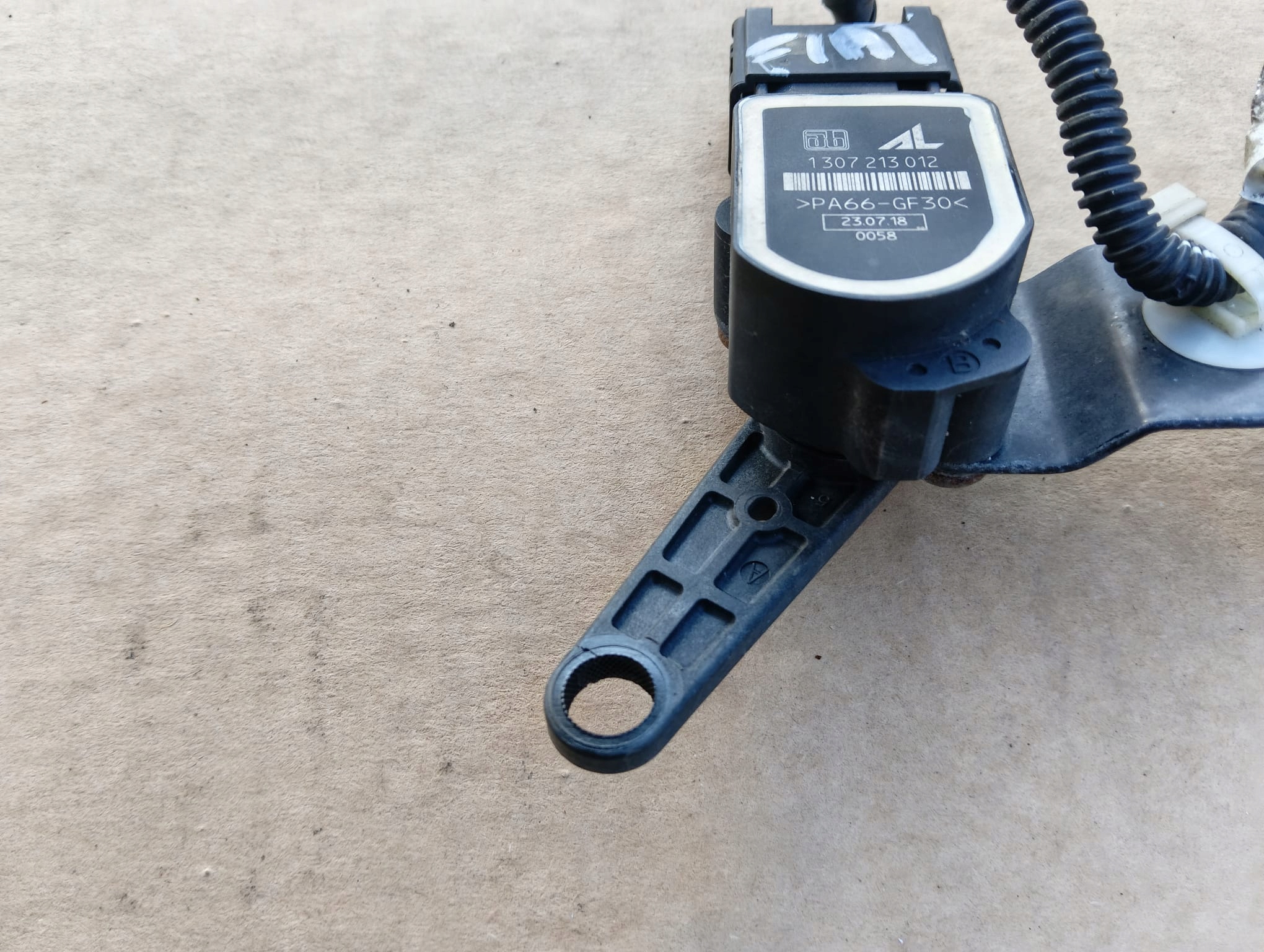 Xenon-ajovalon taso-anturi OEM 1307213012