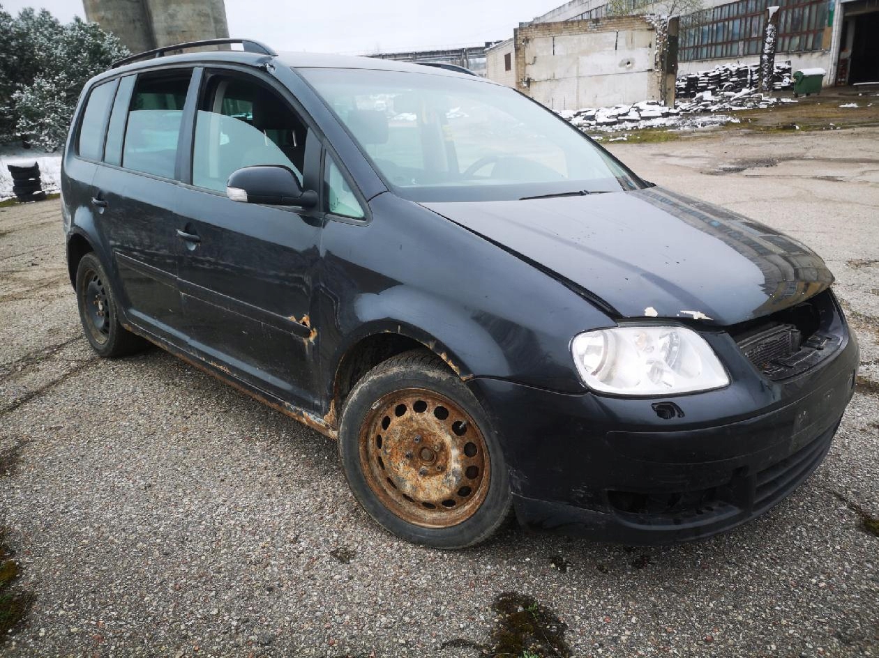 Volkswagen Touran Bakdörrlås - Vänster bak 2005 1.9L image 4