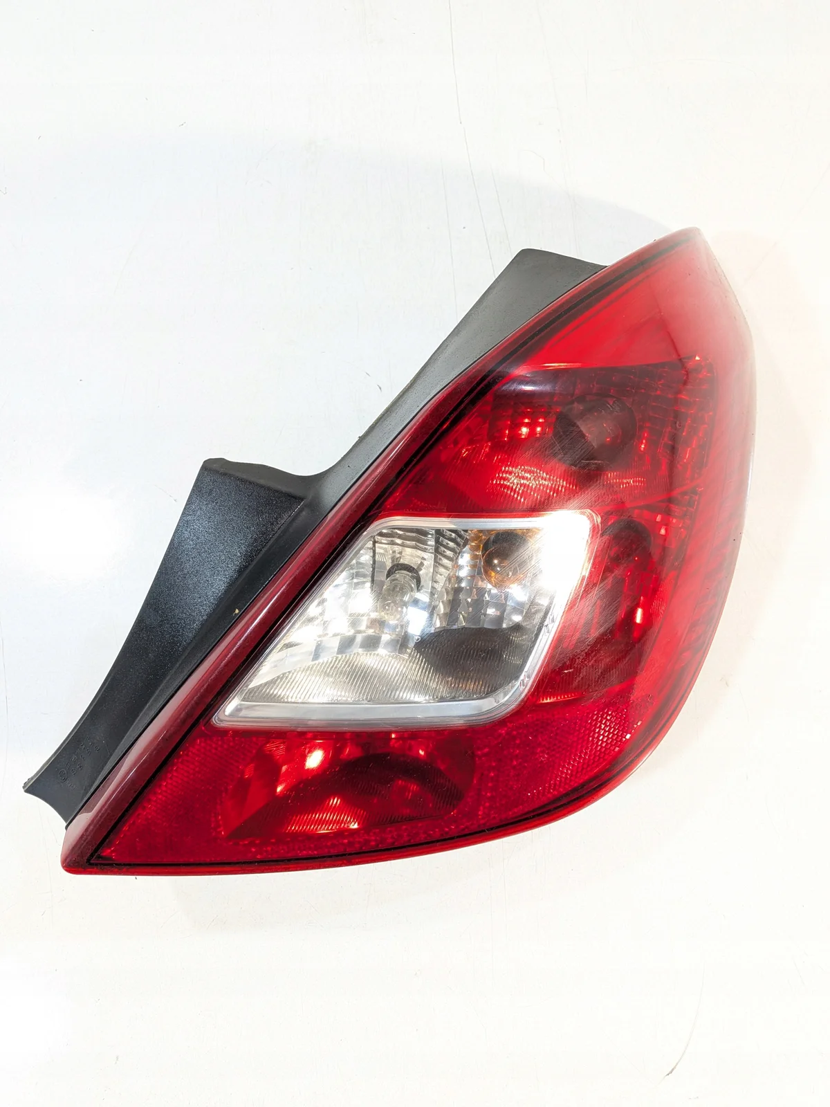 Takavalaisin Opel Corsa D 06-14 Vasen Käytetty