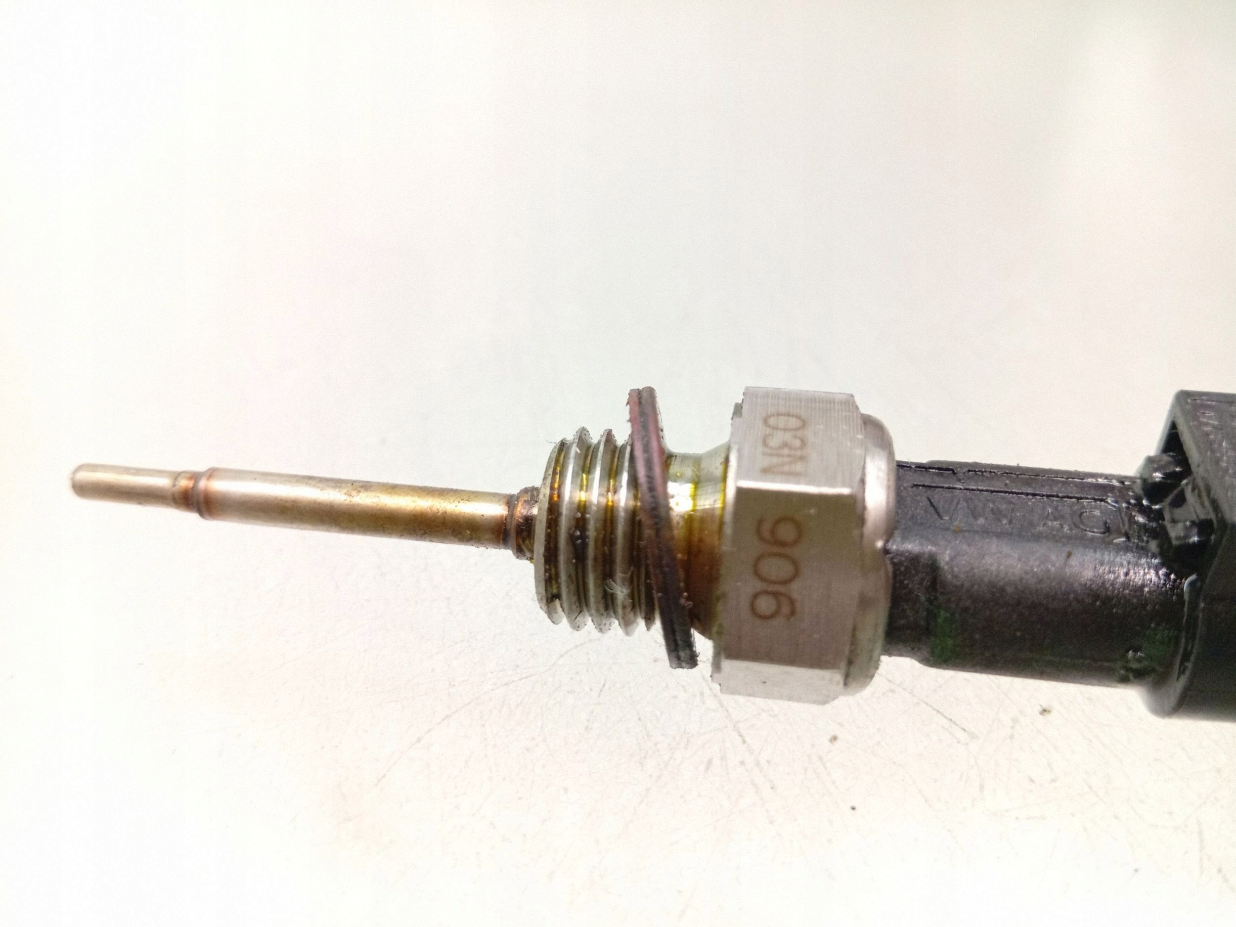 VW Golf VII Kühlmitteltemperatursensor 03N906081A image 3