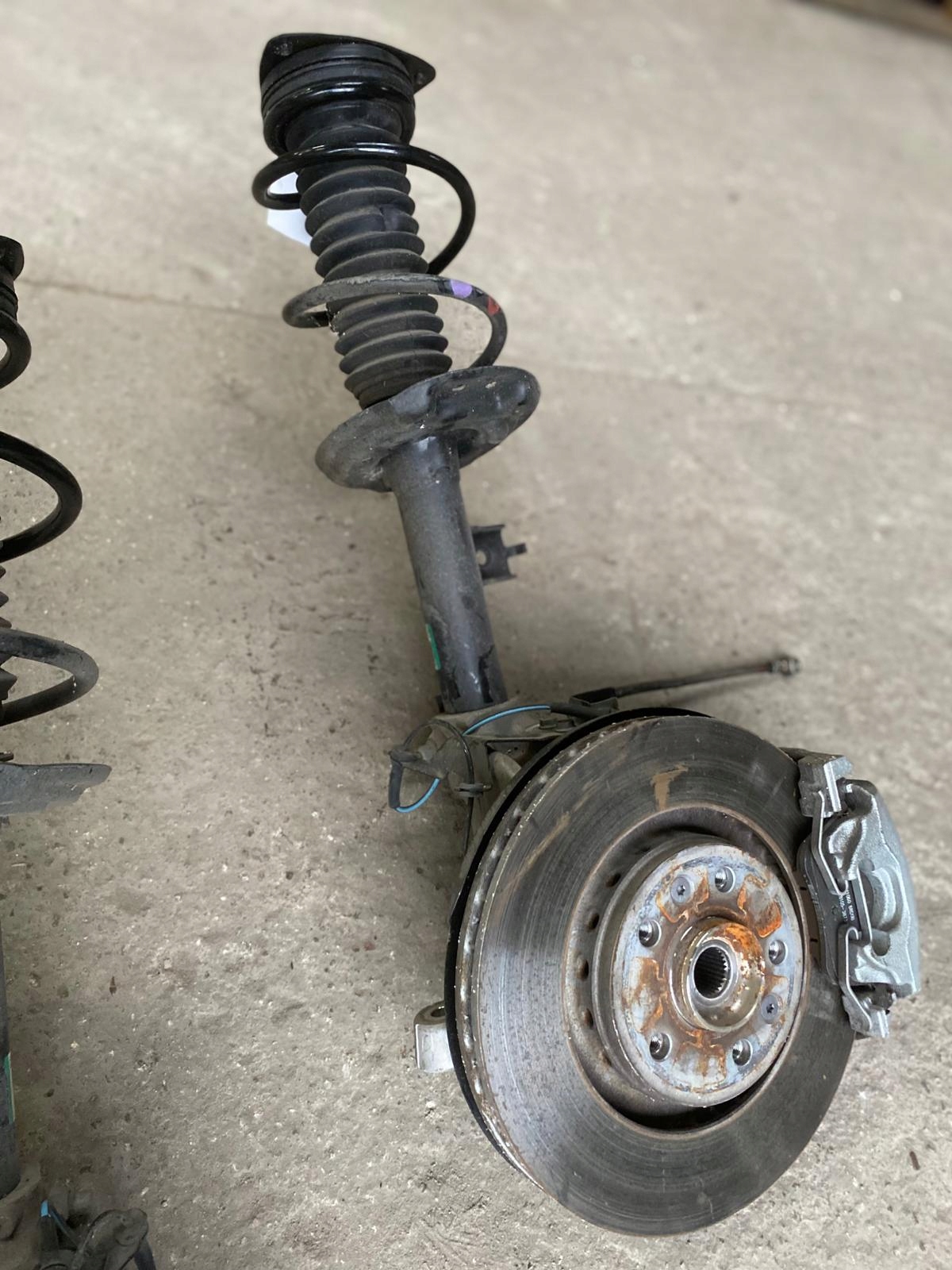 McPherson veerpoot rechts voor Nissan Qashqai III J12 1.3 21- OEM 543026UA1B