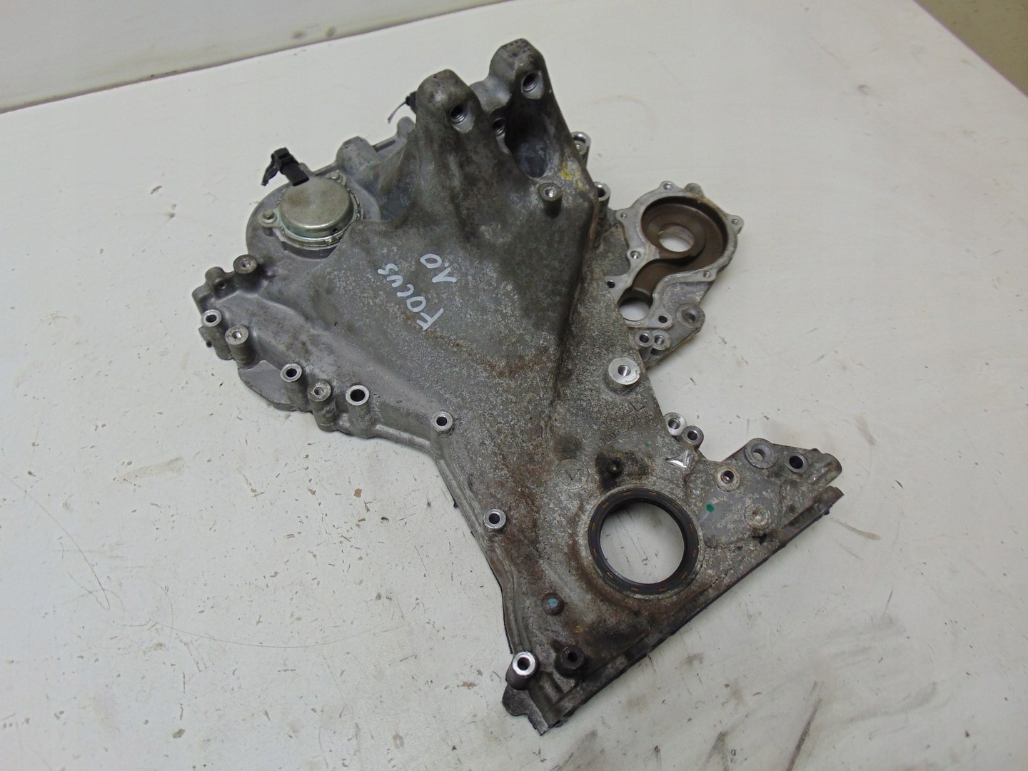 Carcasa de distribución Ford OE CM5G-6059-GC