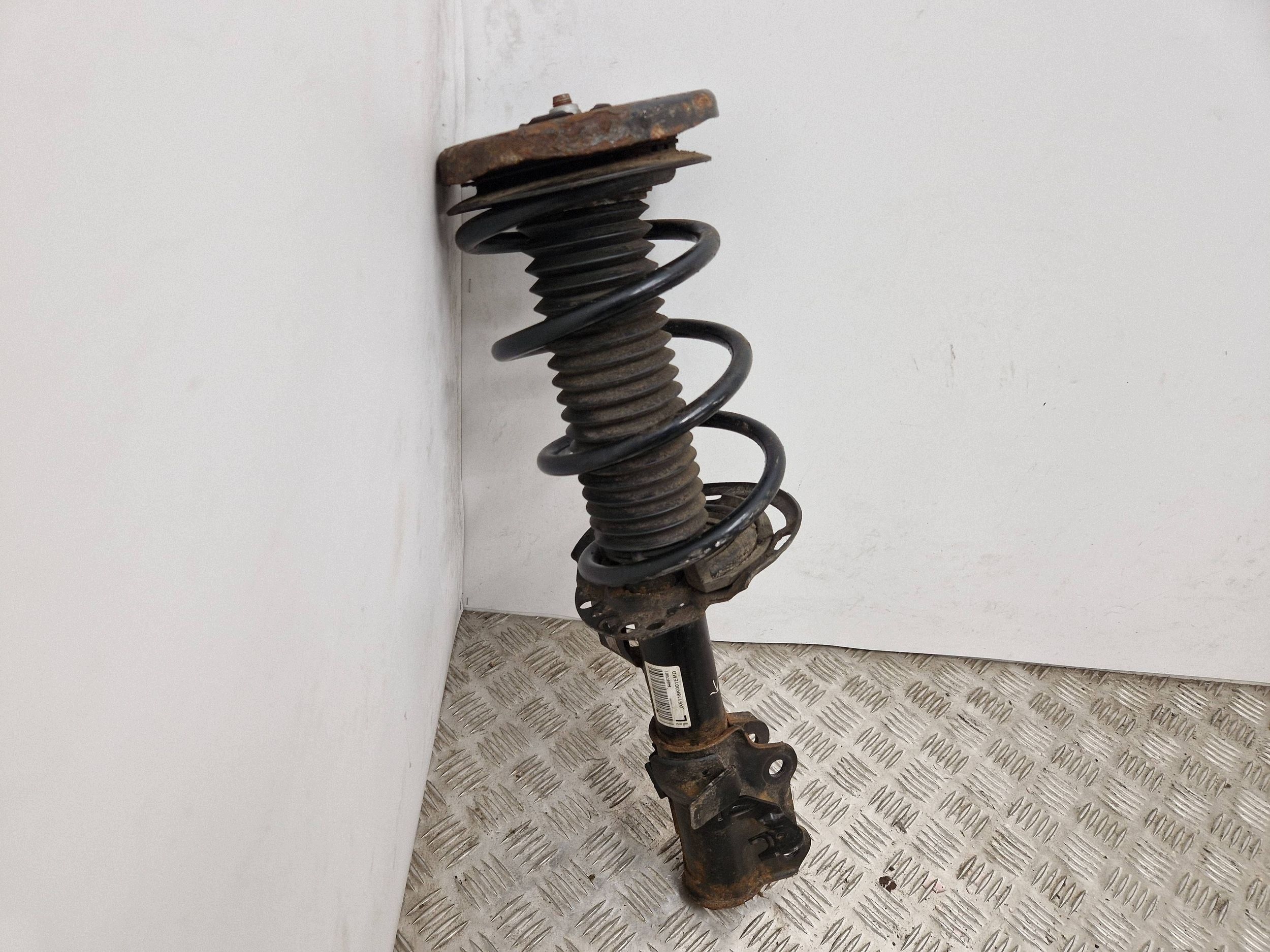 Voorste schokdemper met veer links Ford Focus JX6118K001EMD