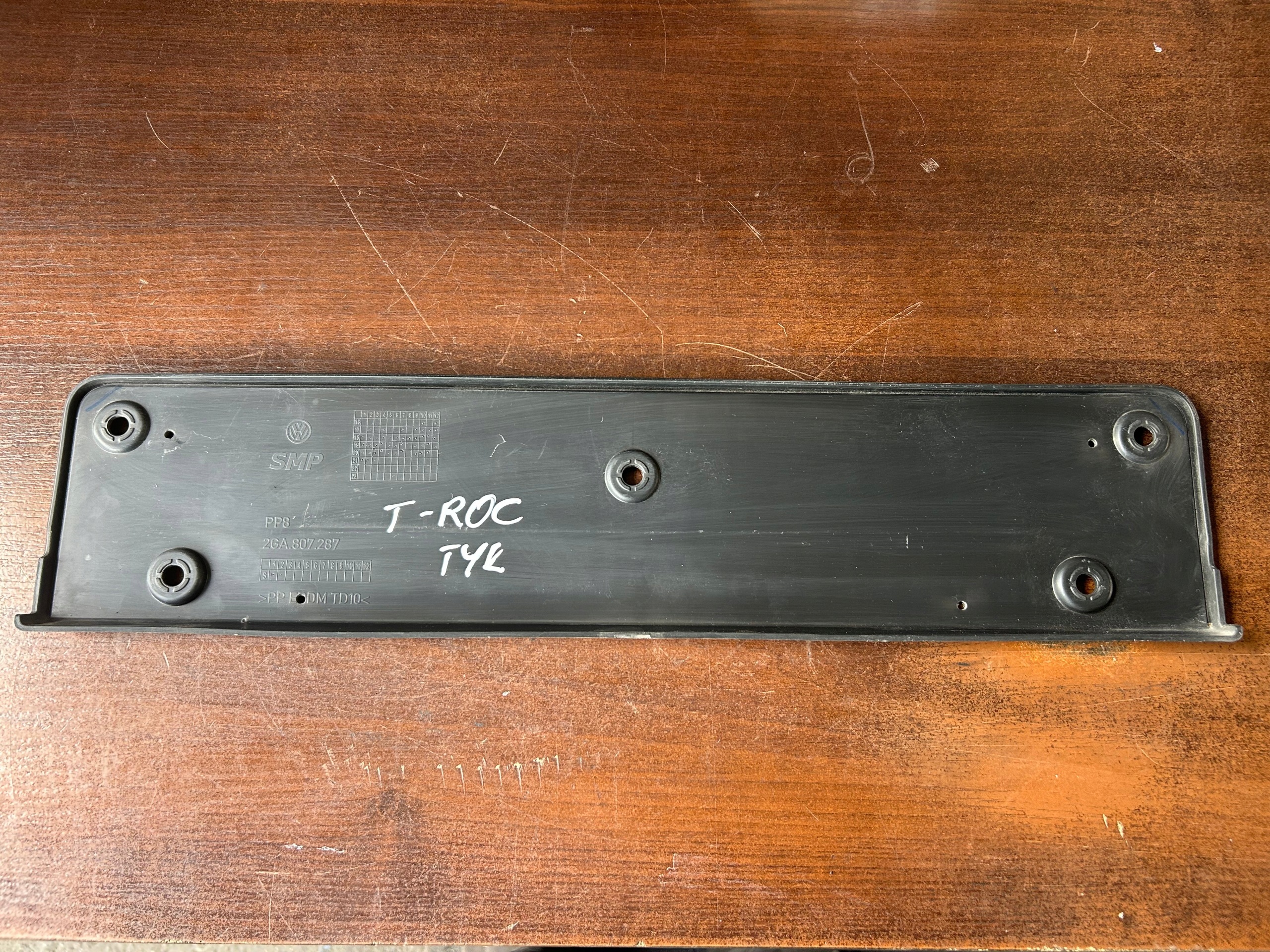 Volkswagen 2GA807287 Kentekenplaathouder Voor