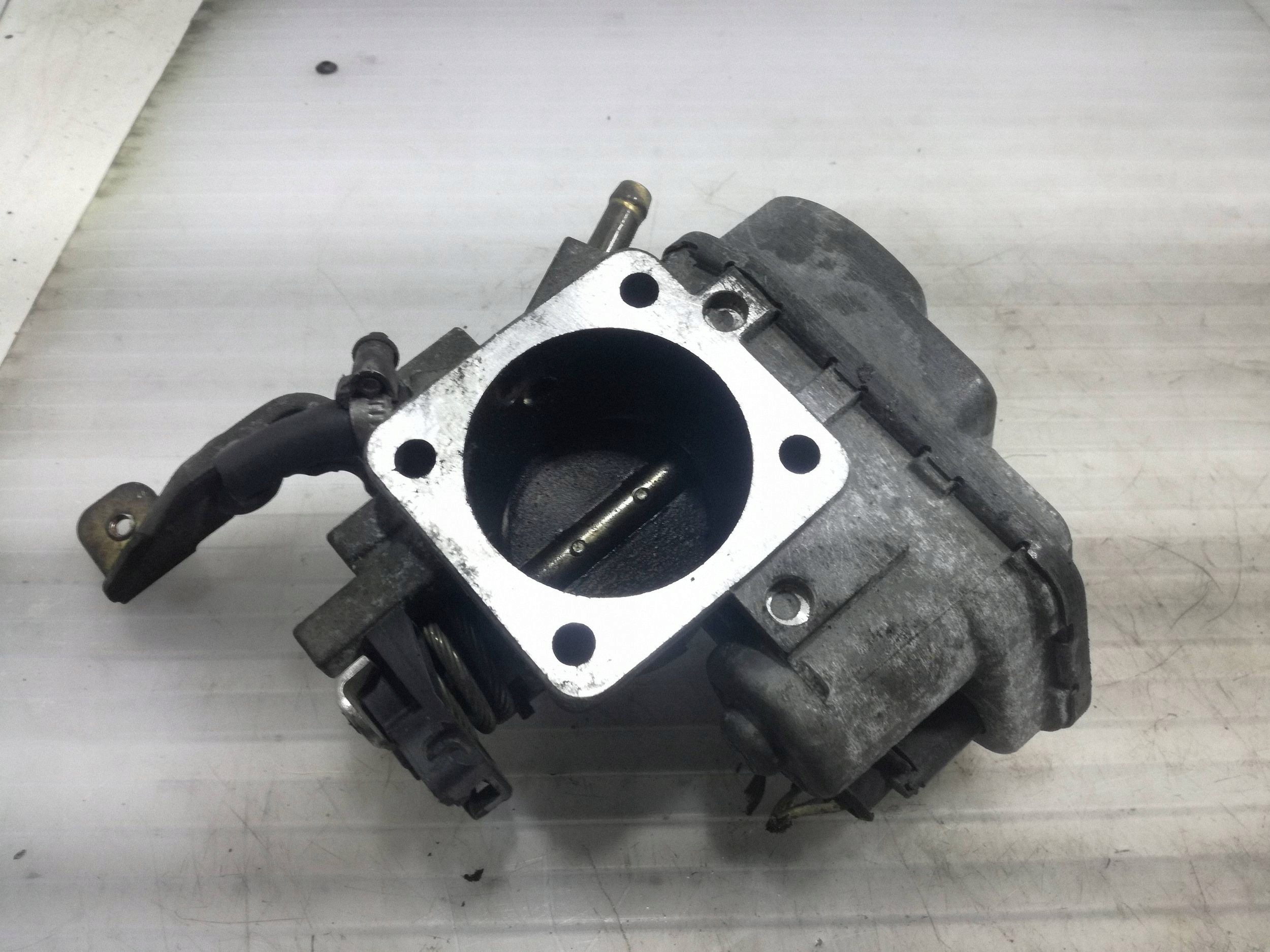 Skoda 030133064D kaasuläppäkotelo