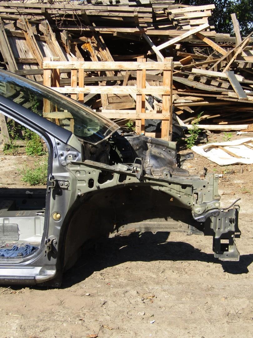 Toyota Auris II Kombi etulokasuojan osa