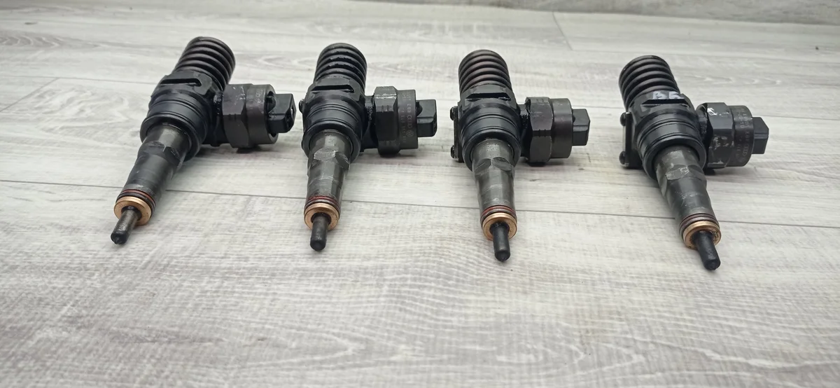 Injecteur Passat B5 1.9 TDI 038130073AJ