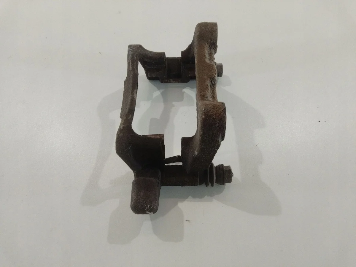 Rear Brake Caliper Bracket VW Golf VI