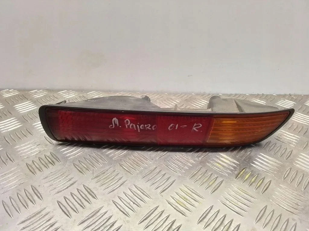 Luz Parachoques Trasero Mitsubishi Pajero 2002