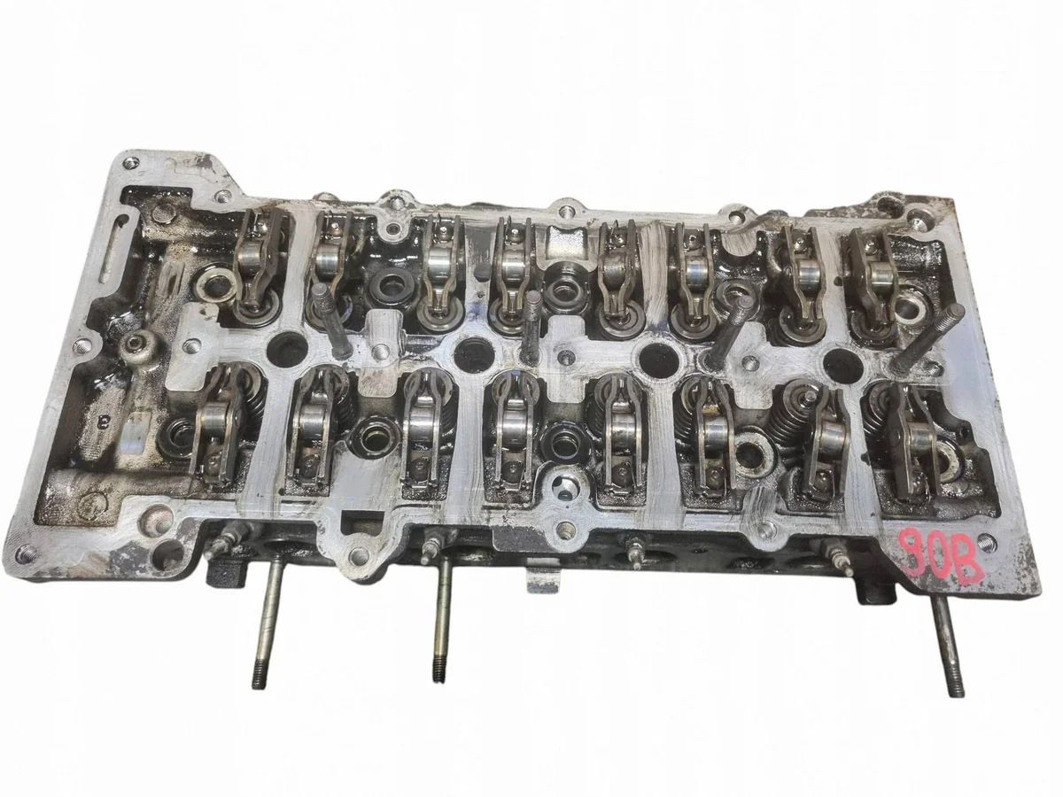 Moottorin sylinterikansi Opel Vectra C 1.9 CDTI