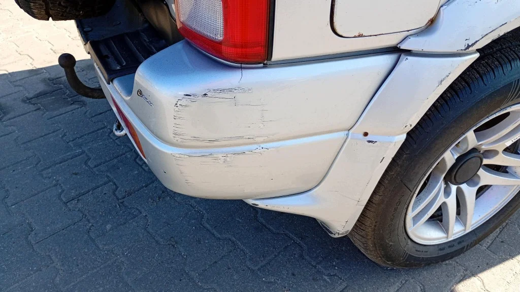 Bakre stötfångare Suzuki Grand Vitara I