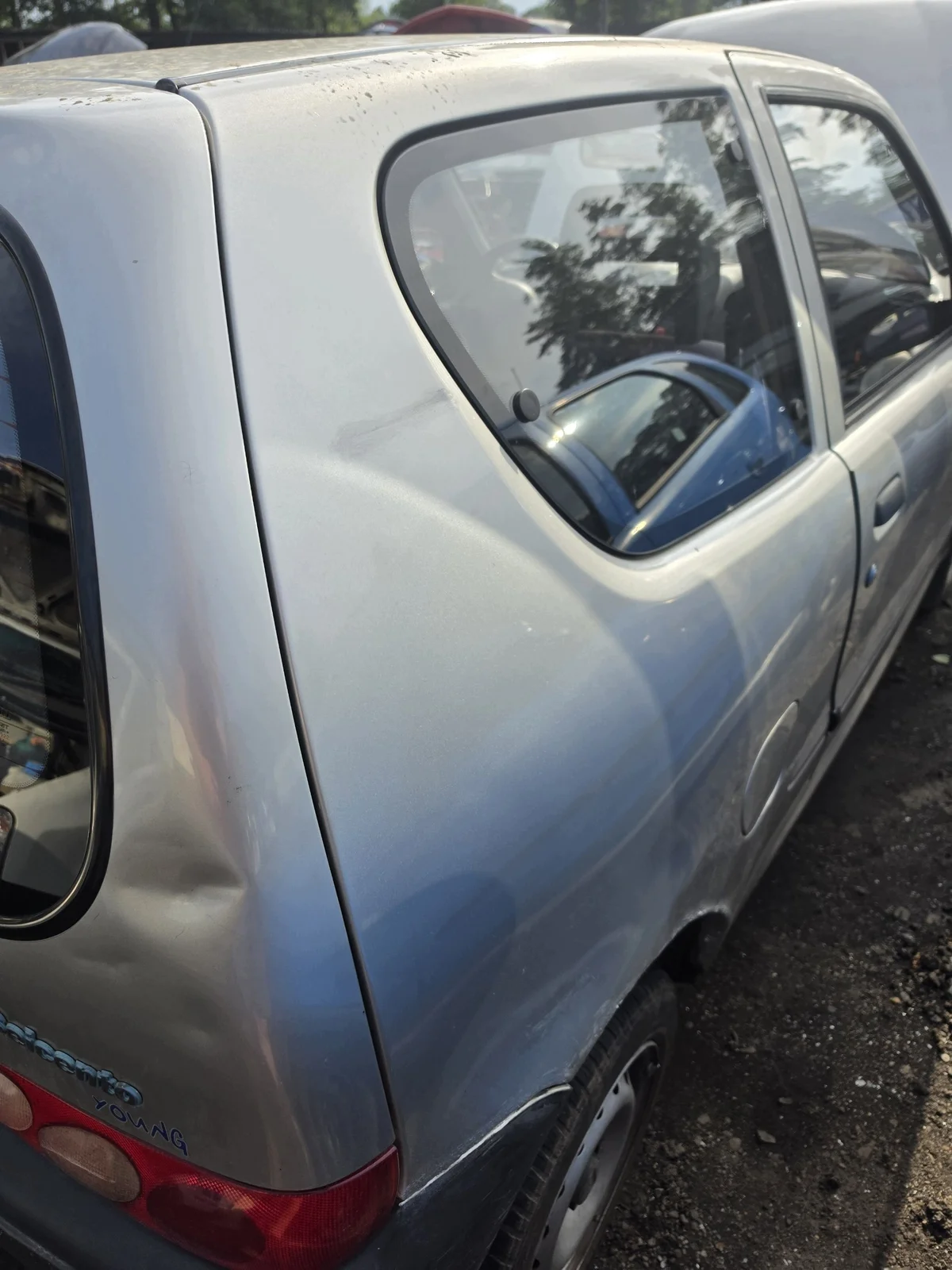 Bakre sidoruta Fiat Seicento vänster