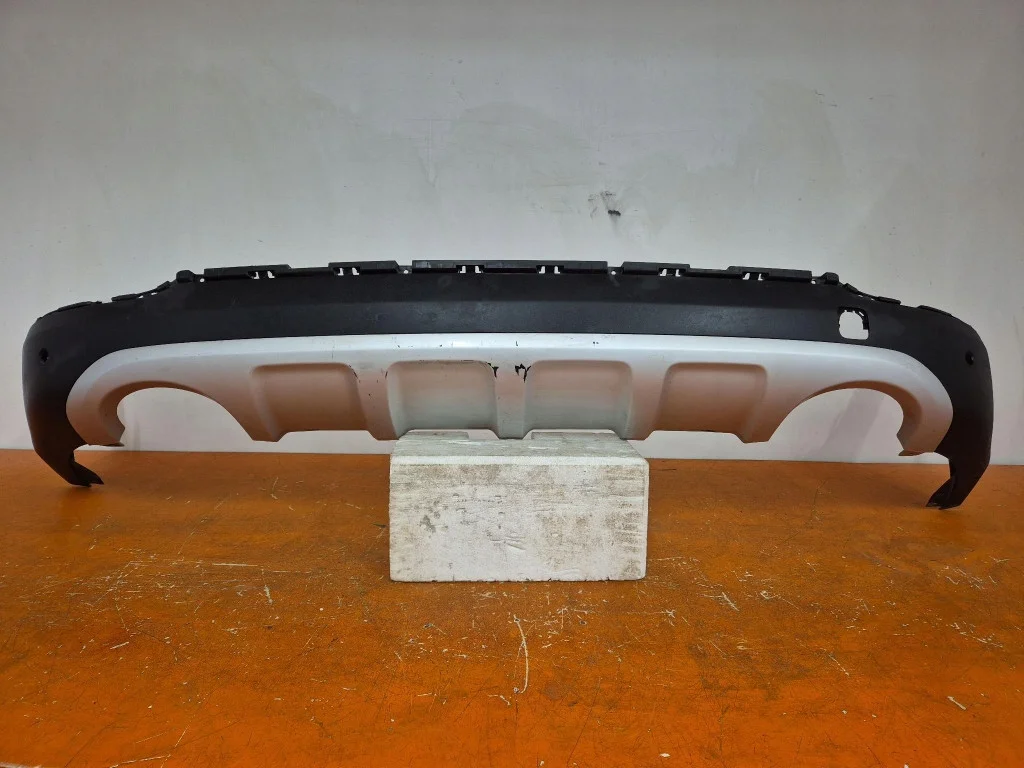 Kia Sportage IV 15- Embellecedor Parachoques Trasero