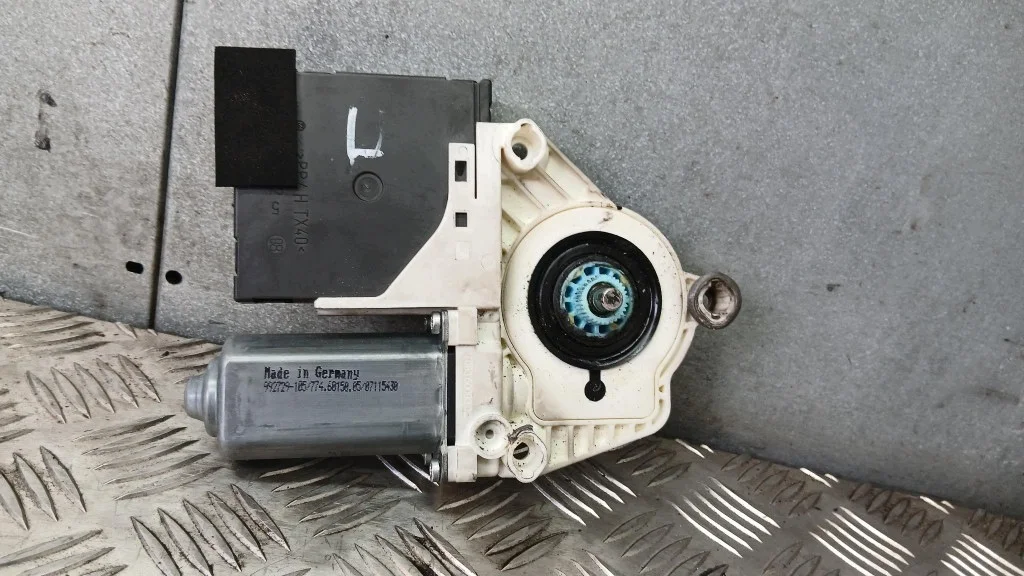 Motor fönsterhiss vänster fram VW Passat B6