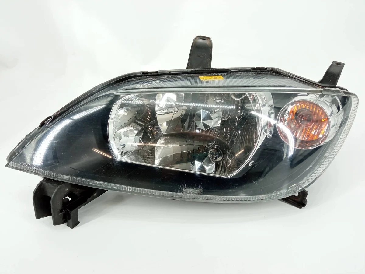 Strålkastare vänster Mazda 2 3M71-13W030-AG