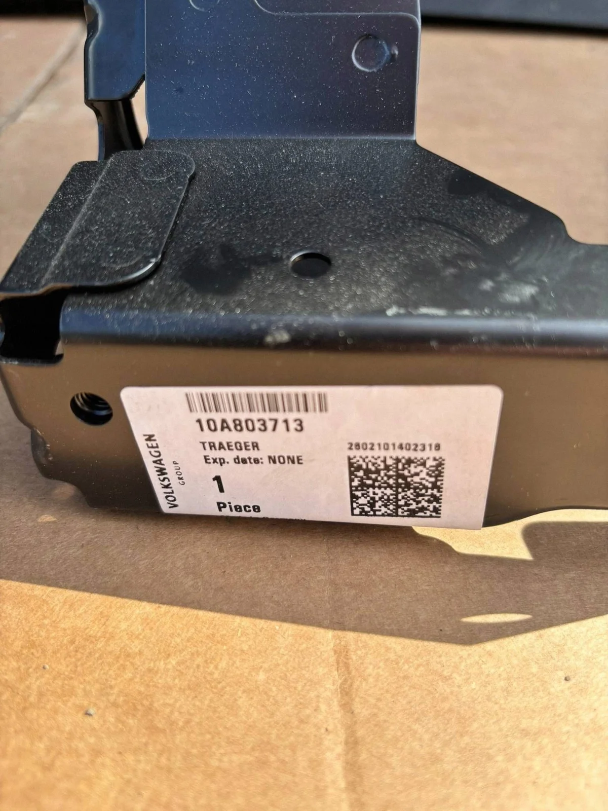 Volkswagen Ajovalojen Tuki OE 10A803713