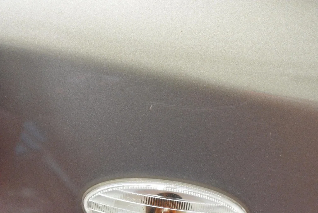 Nissan Note E11 etulokasuoja oikea image 8