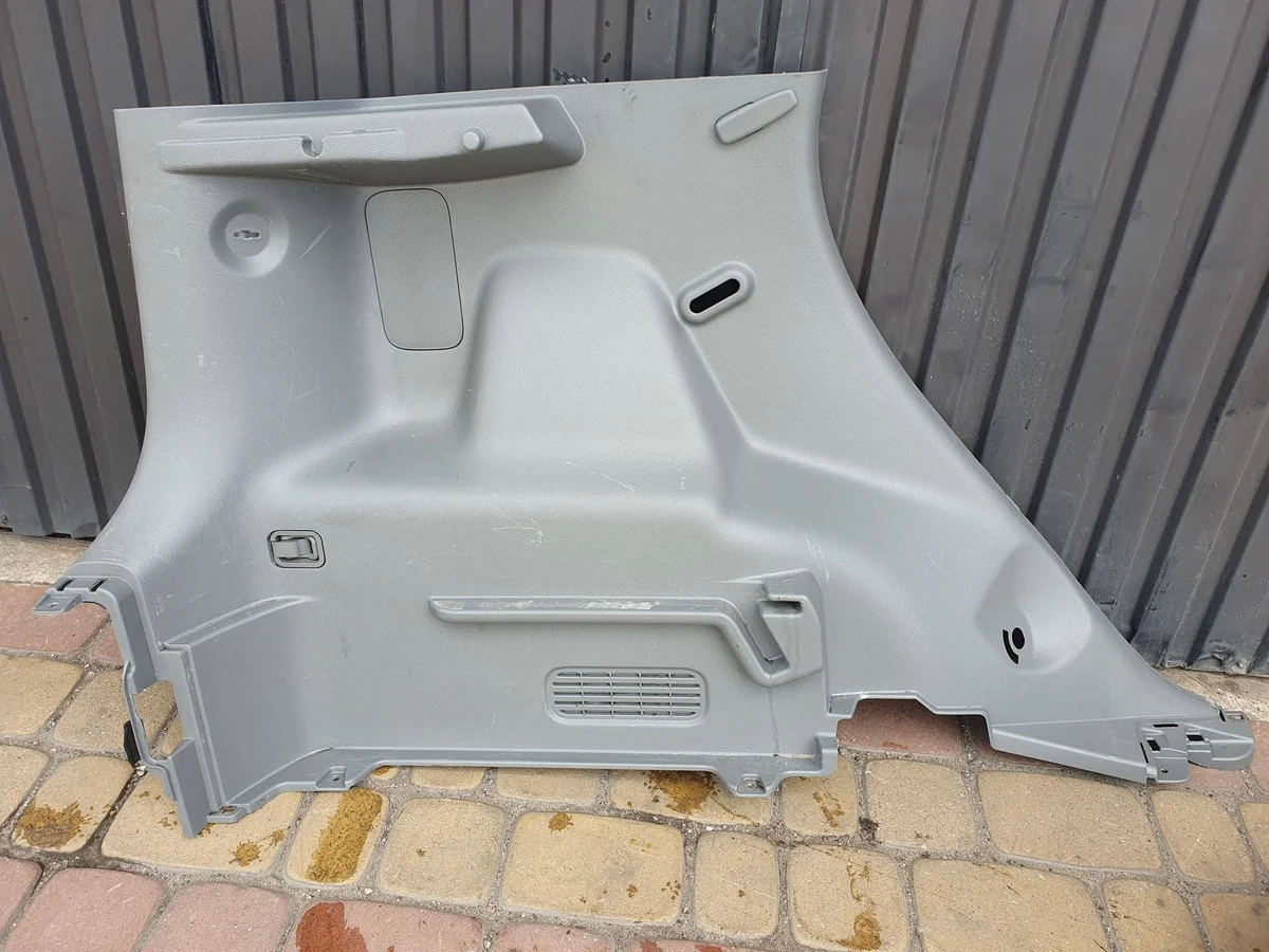 Bokpanel bagageutrymme KIA Soul II EV 85730-E4200