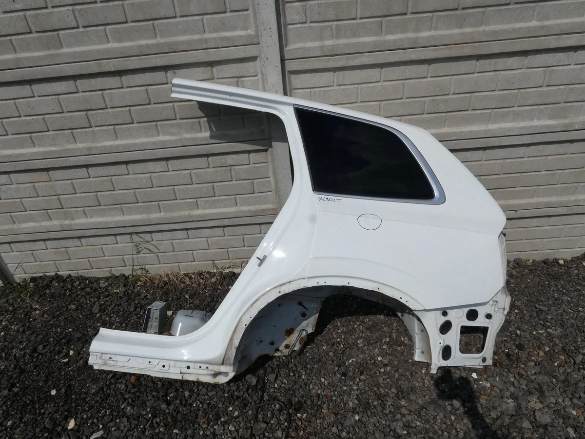 Volvo XC90 II takalokasuojan osa, vasen
