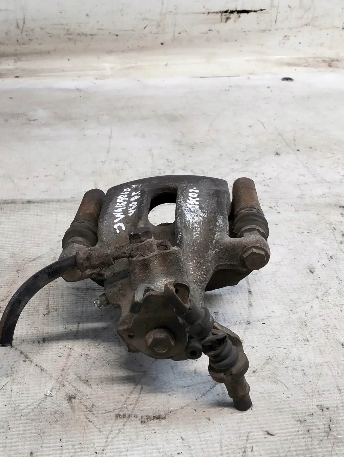 Volvo V40 I Bremssattel vorne rechts image 4