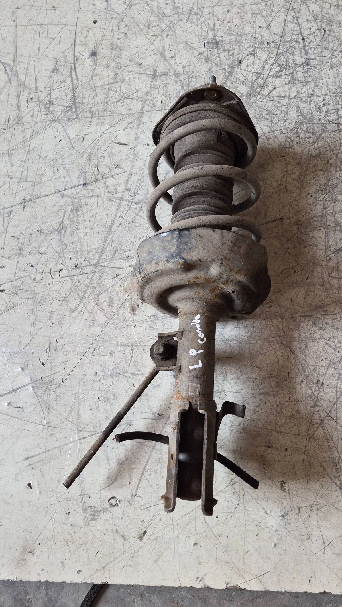 Schokdemper links voor Toyota Corolla E210