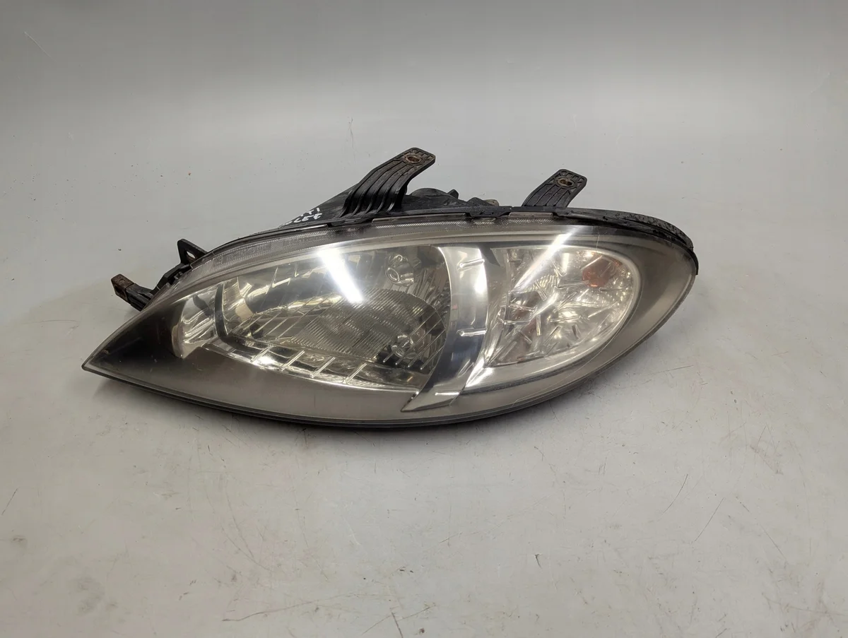Left Headlight Chevrolet Lacetti OEM 00000647