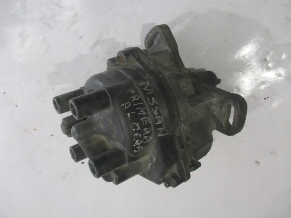 Aparato de ignição Nissan Almera N16 22100-99B03