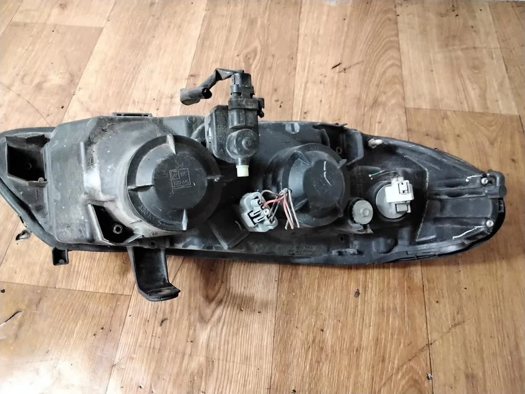 Phare avant gauche Nissan Almera N16