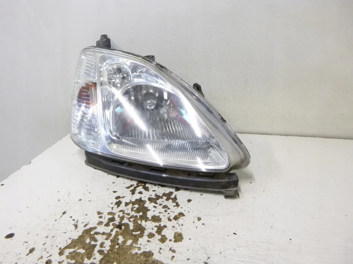 Honda Civic VII ajovalaisin oikea, käytetty
