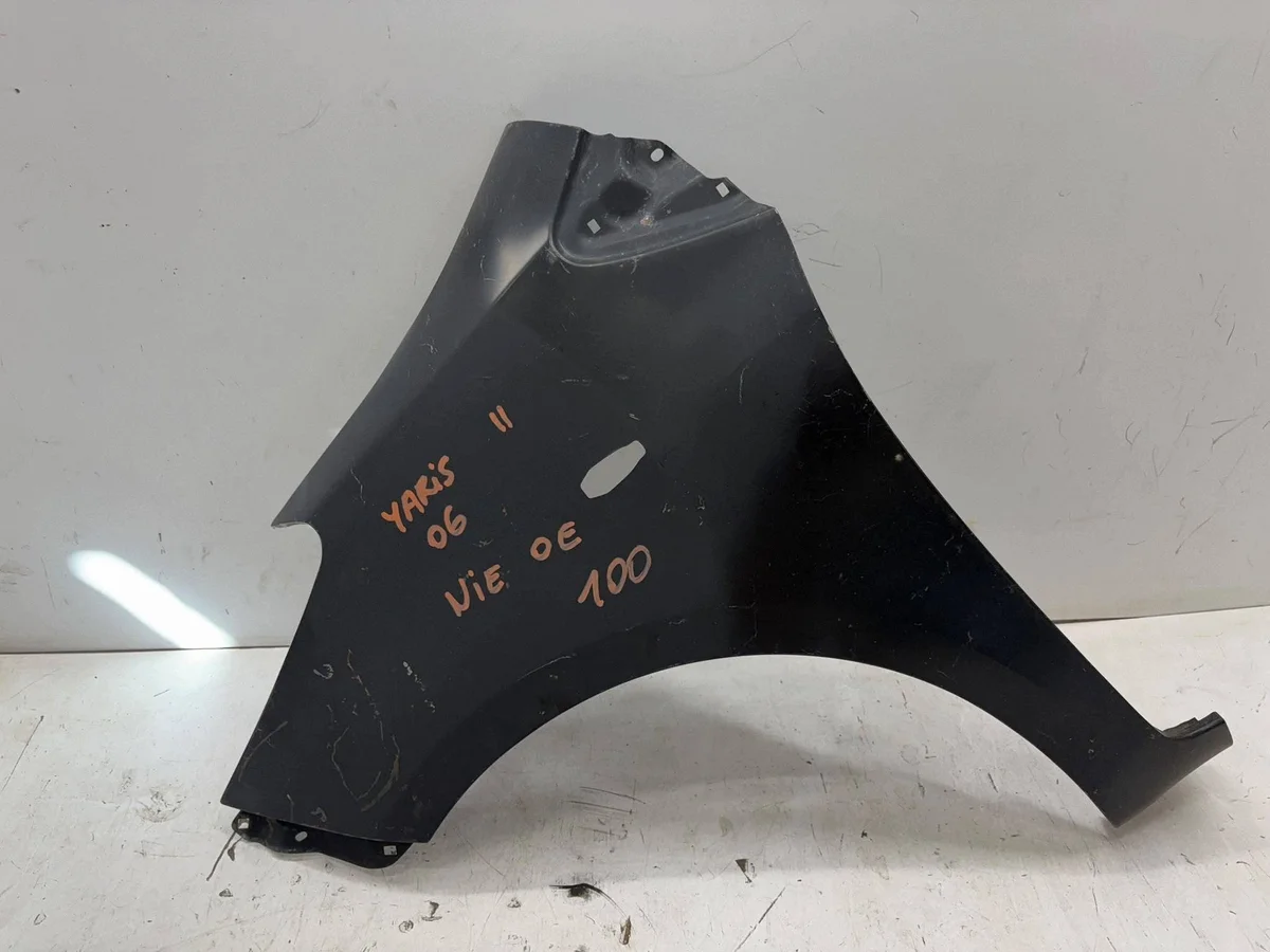 Toyota Yaris II lokasuoja vasen etu
