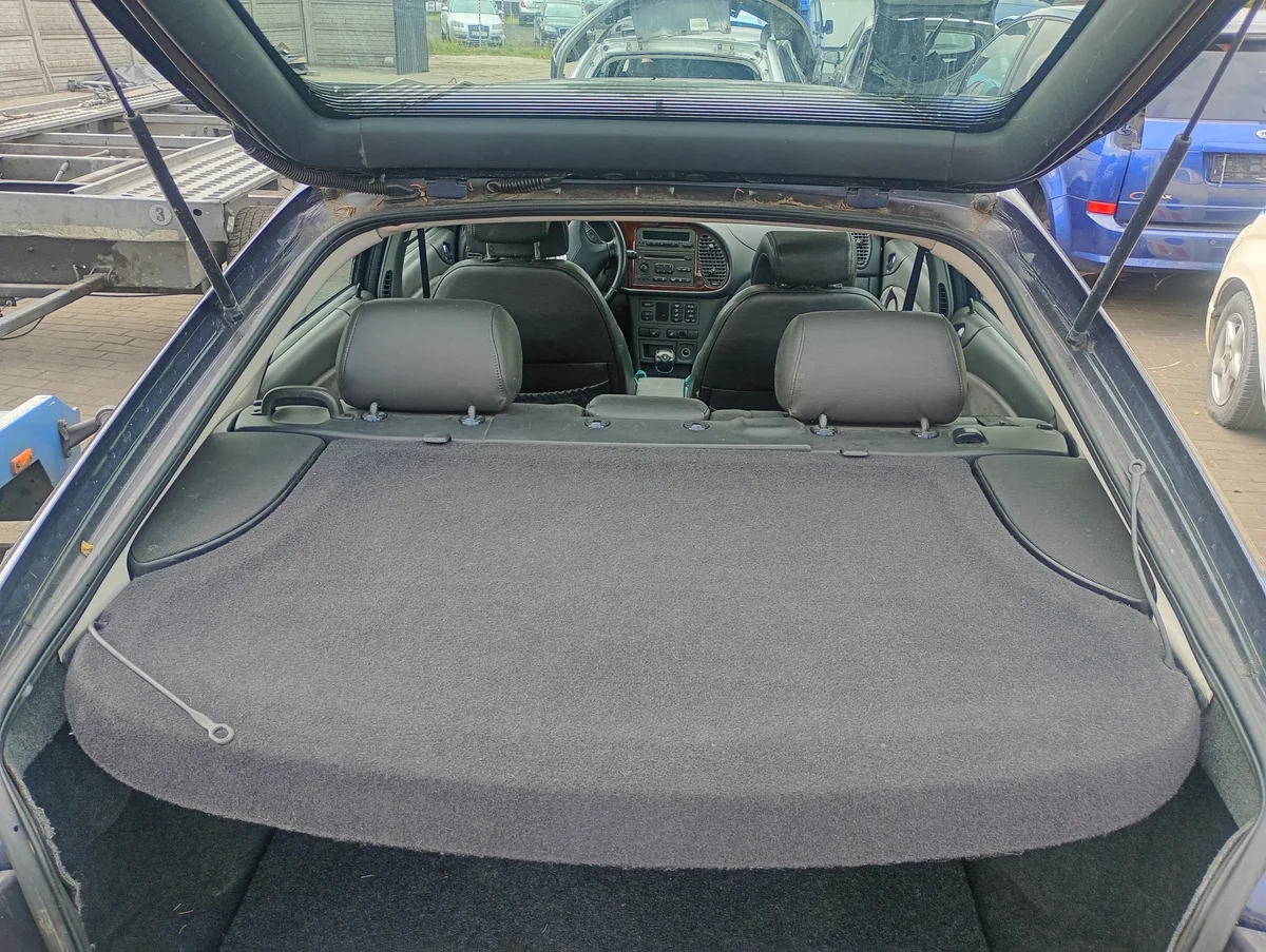 Tavaratilan hylly Saab 9-3 98-02 Käytetty