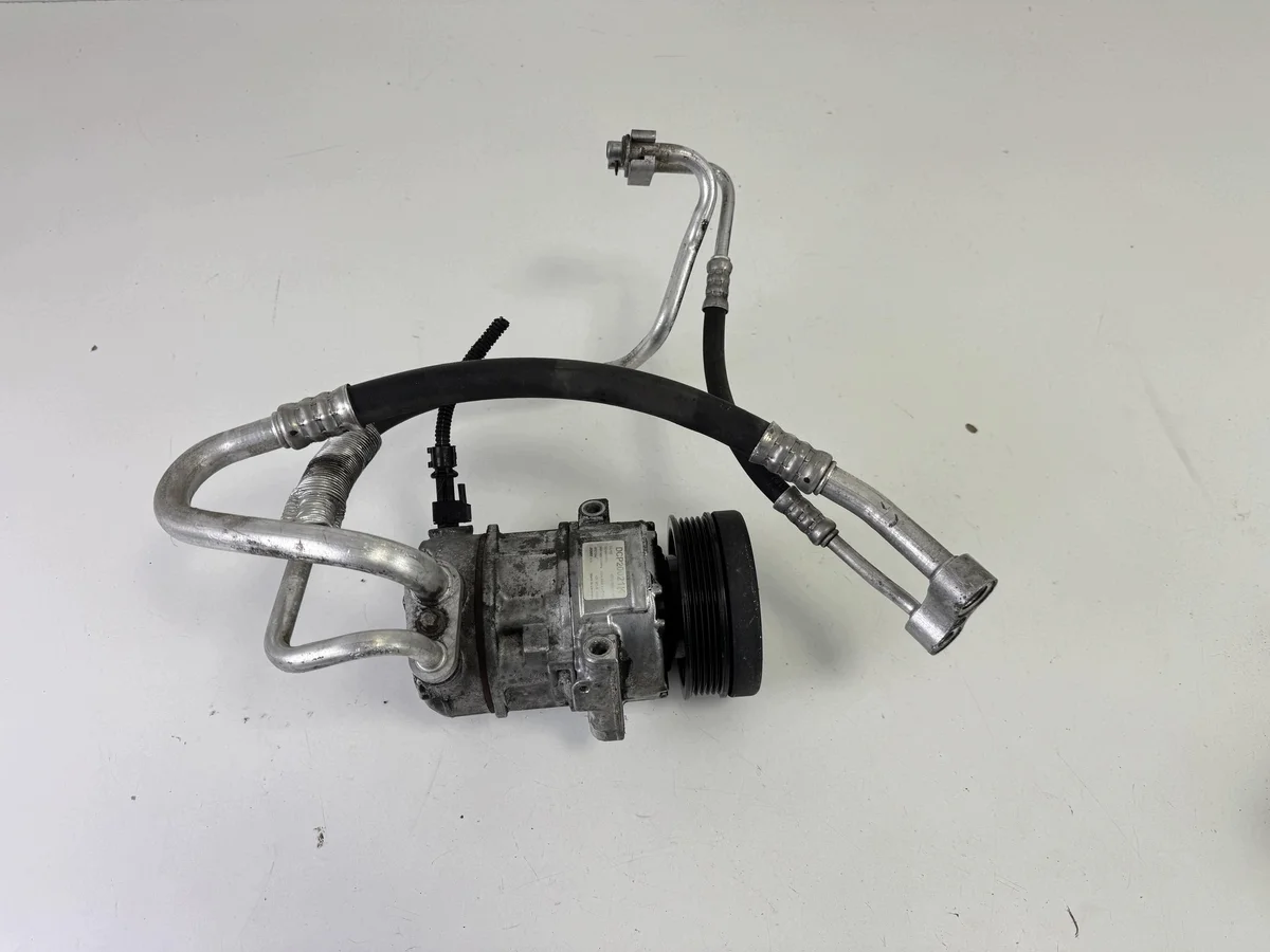 Ilmastoinnin kompressori Opel Corsa D 1.4 16v