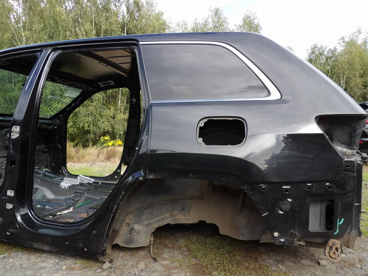 Jeep Grand Cherokee WK2 lokasuoja vasen taka