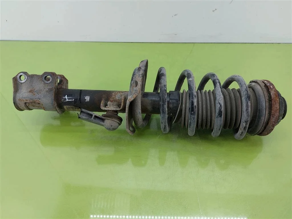 Iskunvaimennin Opel Zafira B etu vasen