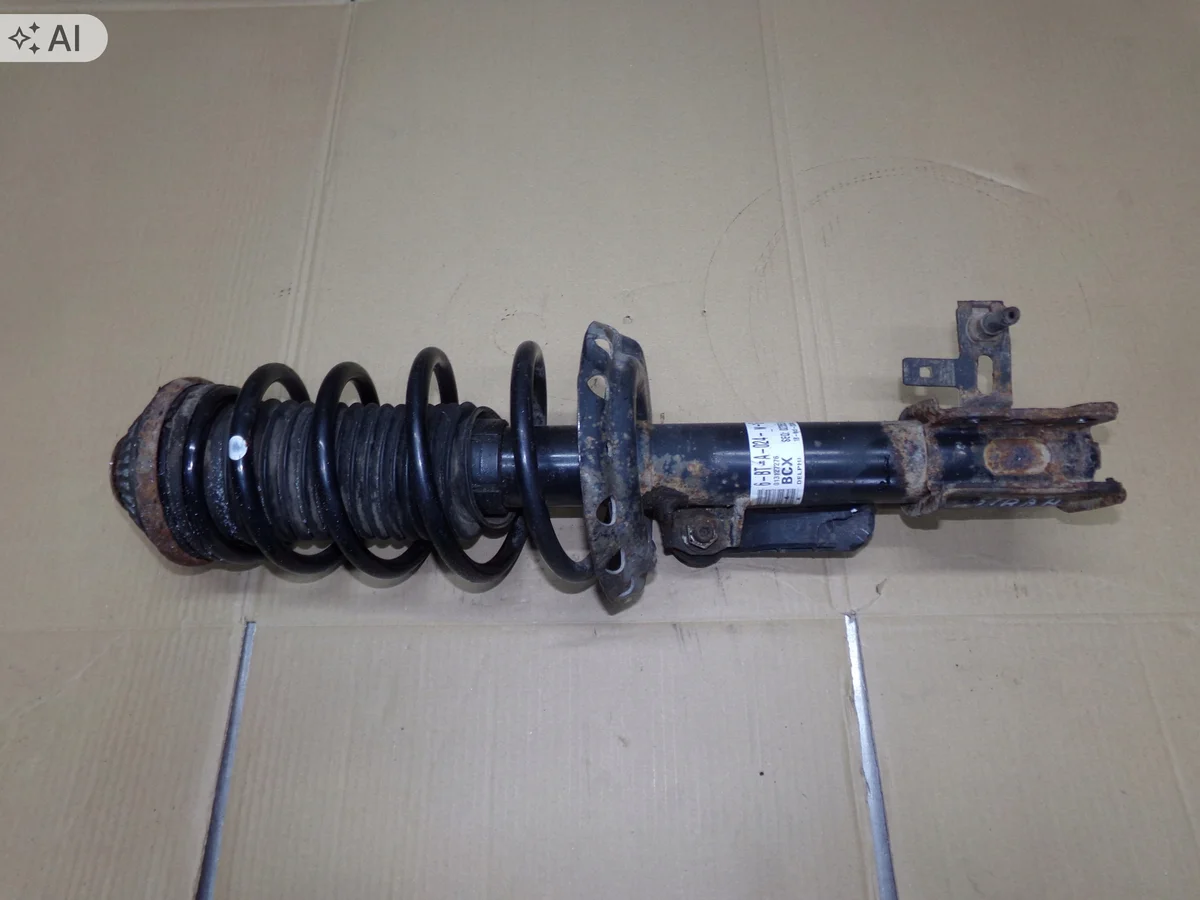 Höger fram stötdämpare Opel Astra H 1.6 16V