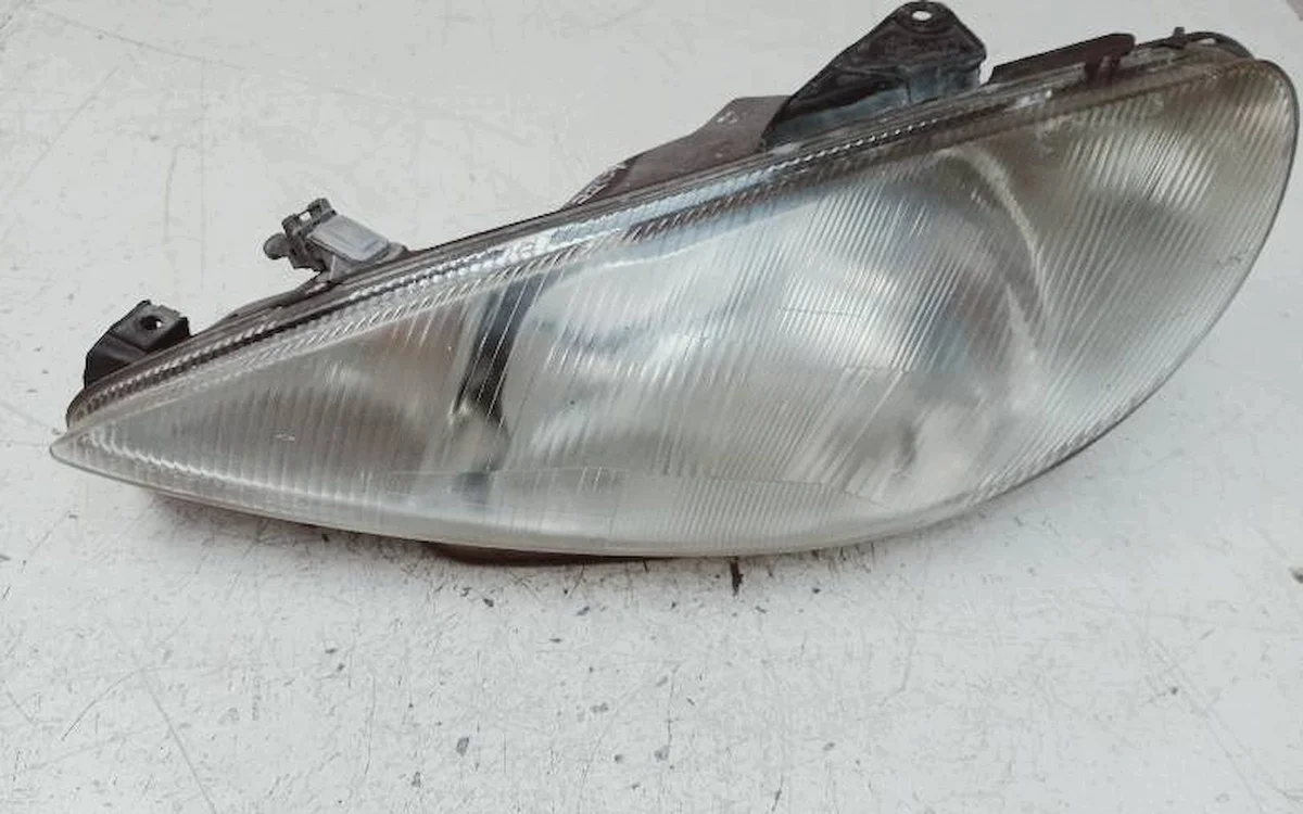 Phare avant gauche Peugeot 206 - OEM 9640559580