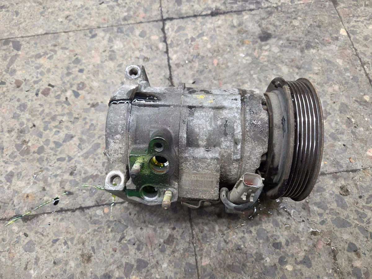 Ilmastoinnin kompressori Dodge Grand Caravan 04781547AC