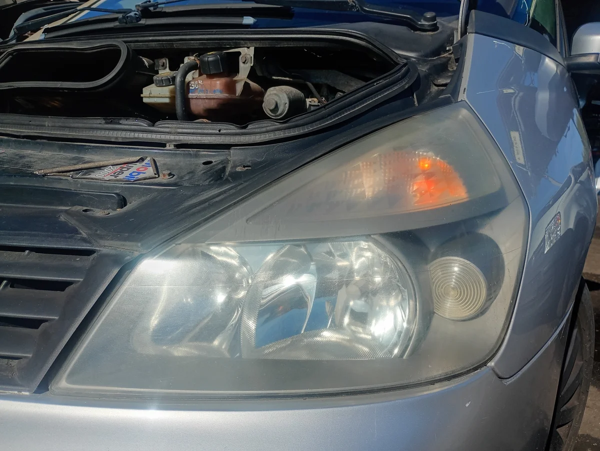 Farol Renault Espace IV 2003-2012 Esquerdo