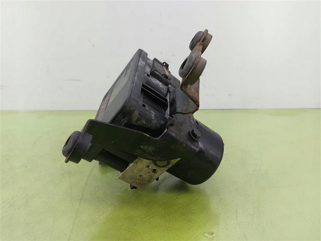 ABS-pumppu VW Golf IV 1J0614517E
