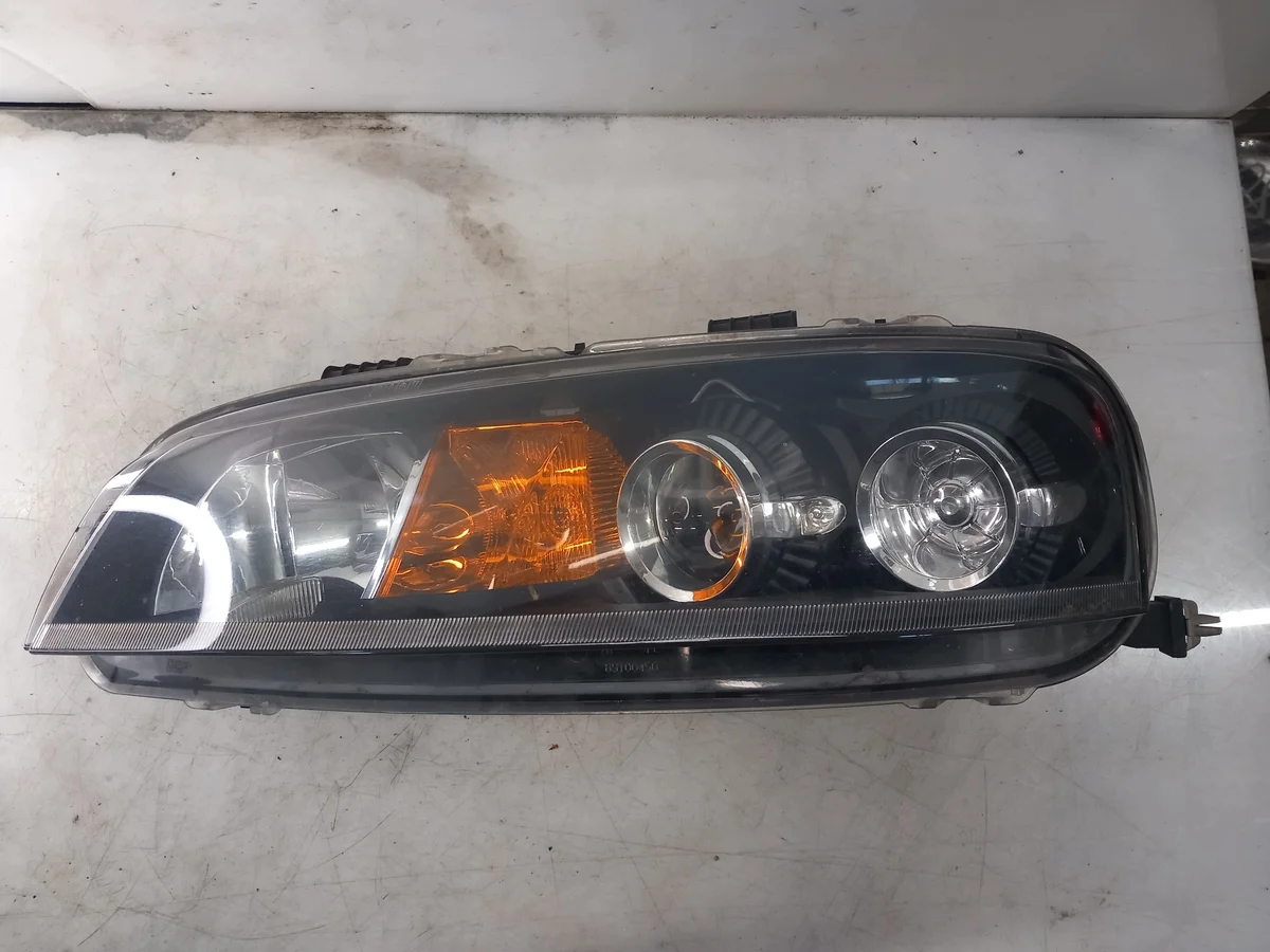 Faro Izquierdo Fiat Punto 89100452