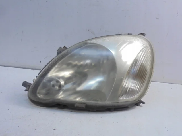Faro Toyota Yaris I FL 03-05 Izquierdo