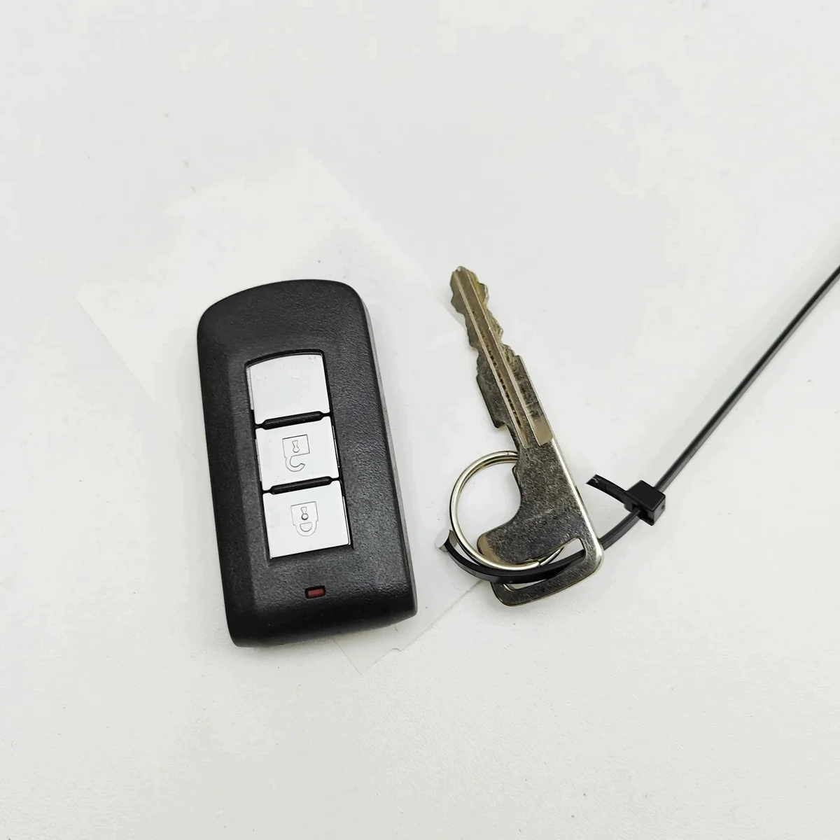 Clé Mitsubishi L200 / Triton 6370B986 image 5