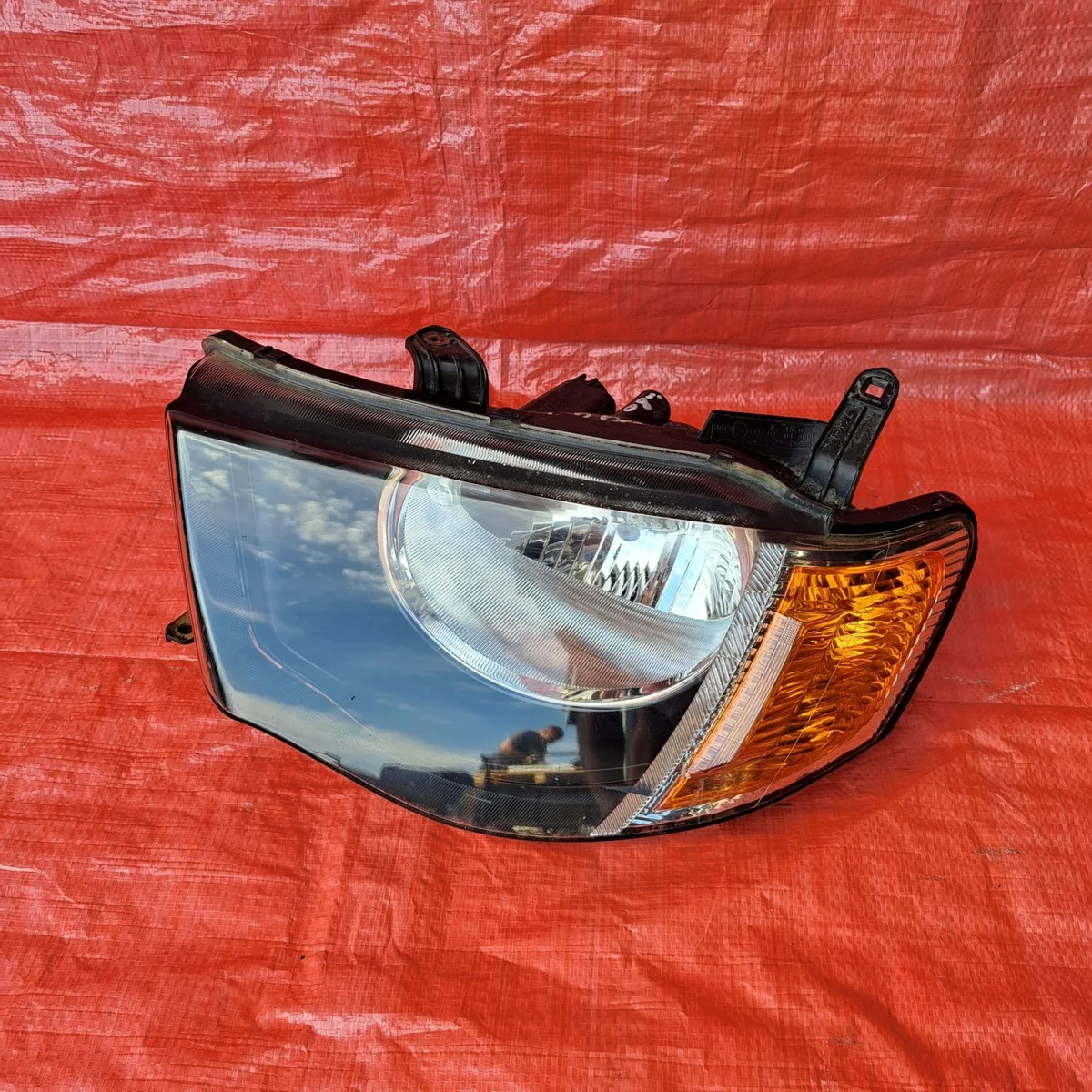 Farol Esquerdo Mitsubishi L200 MN146191